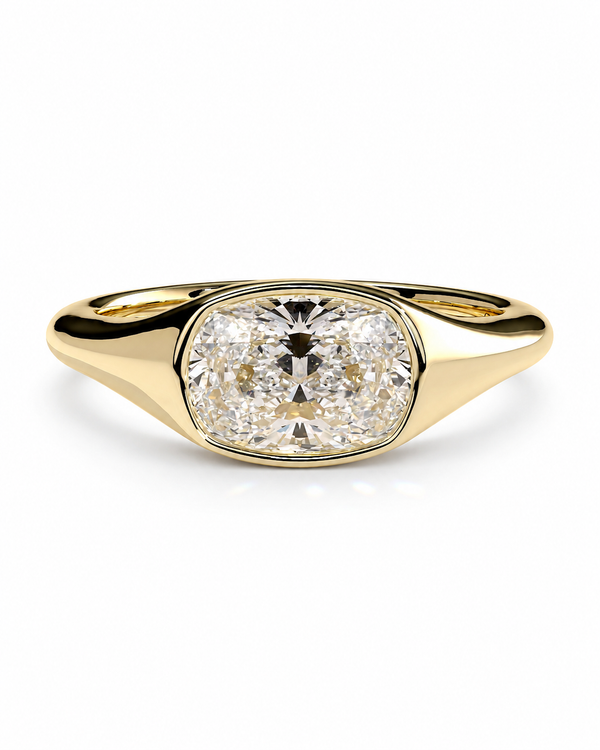 color_10K_YG, color_14K_YG &&A yellow gold ring featuring a large cushion-cut diamond in a bezel setting, shown on a clean white background.