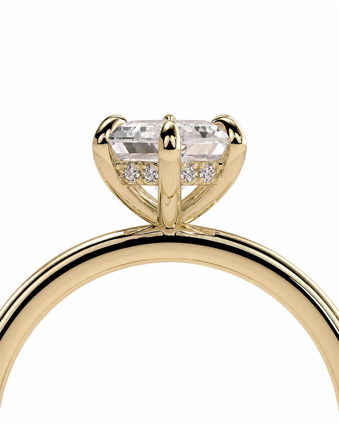 color_10K_YG, color_14K_YG &&A close-up of a yellow gold solitaire engagement ring featuring a large rectangular clear gemstone in a four-prong setting, with small accent diamonds on the band, shown against a plain white background.