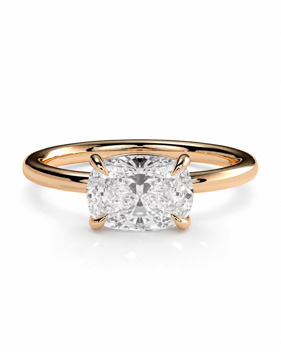 color_10K_RG, color_14K_RG &&
A classic solitaire engagement ring featuring a cushion-cut diamond set in a polished rose gold band, shown on a clean white background.