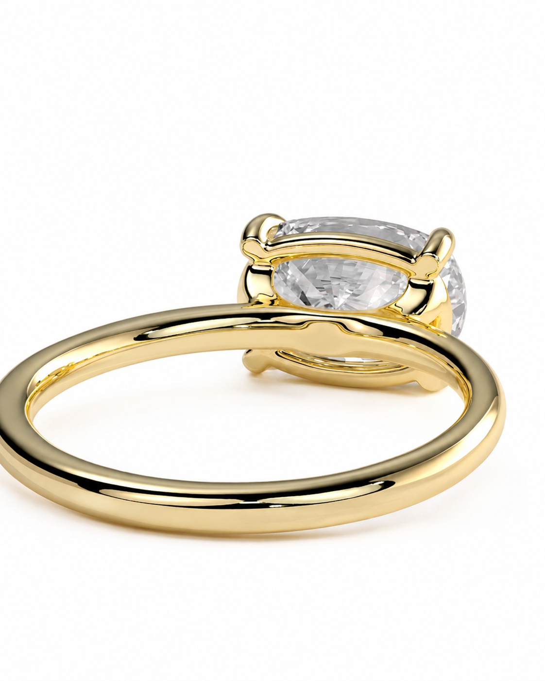 color_10K_YG, color_14K_YG &&
A yellow gold ring with a wide band and a marquise-cut clear gemstone in a prong setting, shown on a plain white background.