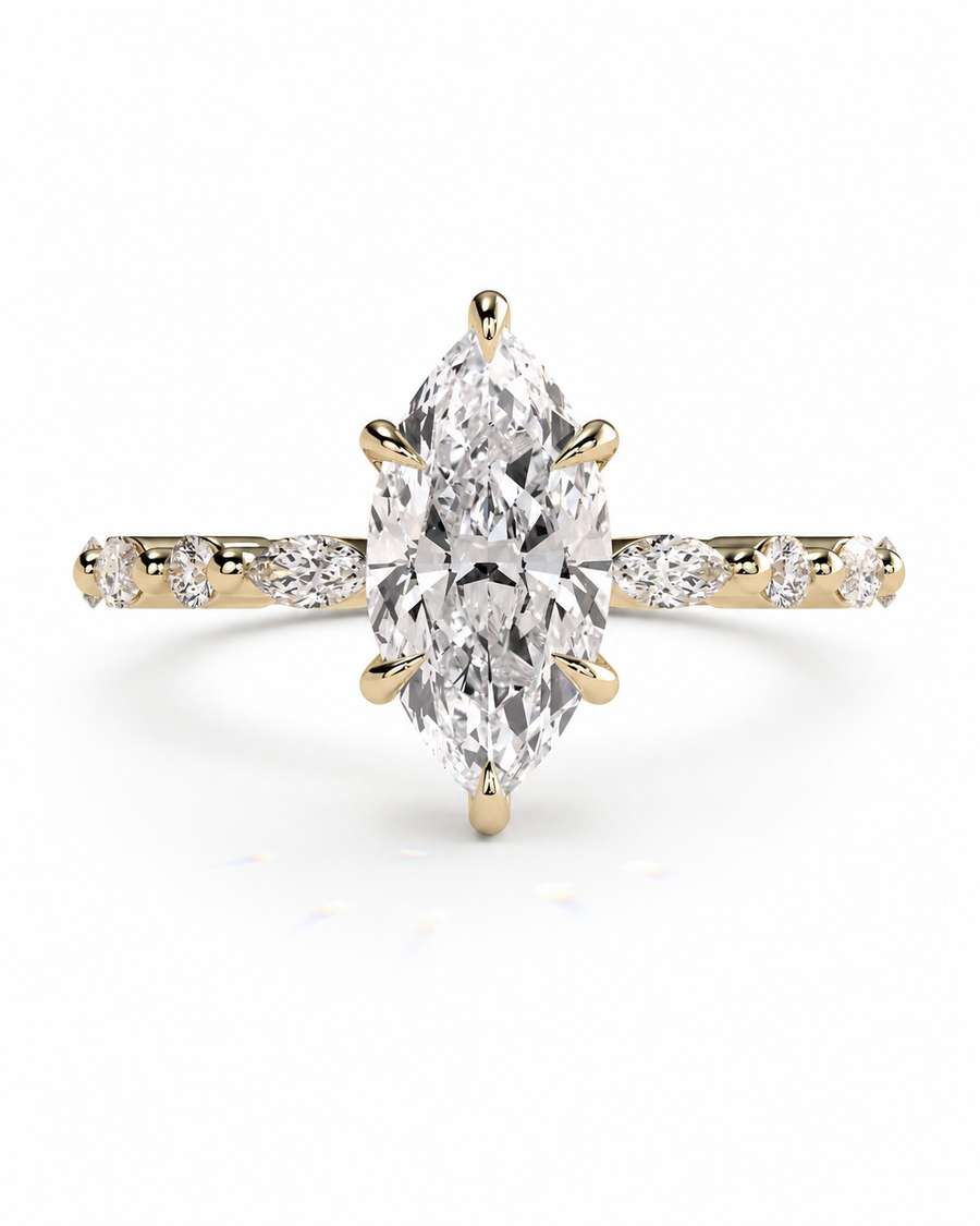 color_10K_YG, color_14K_YG &&A yellow gold ring featuring a large marquise-cut diamond center stone with a diamond-encrusted shank, shown on a clean white background.