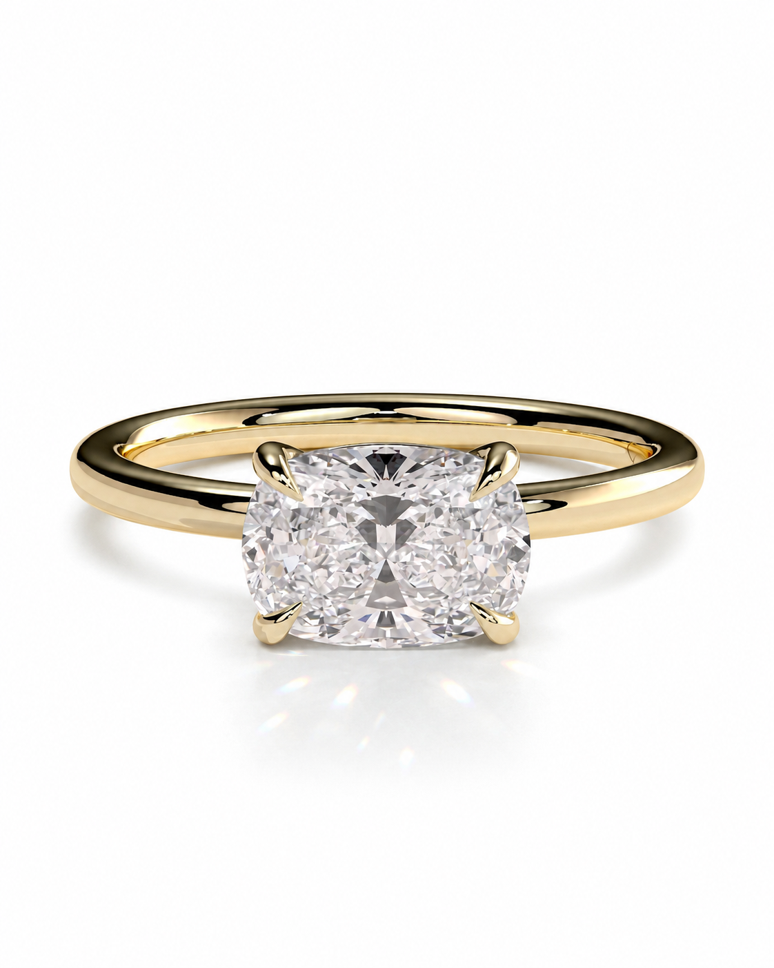 color_10K_YG, color_14K_YG &&A yellow gold solitaire engagement ring featuring a cushion-cut diamond center stone in a four-prong setting, shown on a clean white background with a soft reflection.