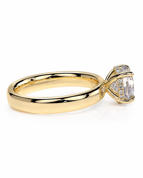 color_10K_YG, color_14K_YG &&A yellow gold ring with a triangular clear gemstone in a prong setting, accented with small round stones along the band, shown on a white background.