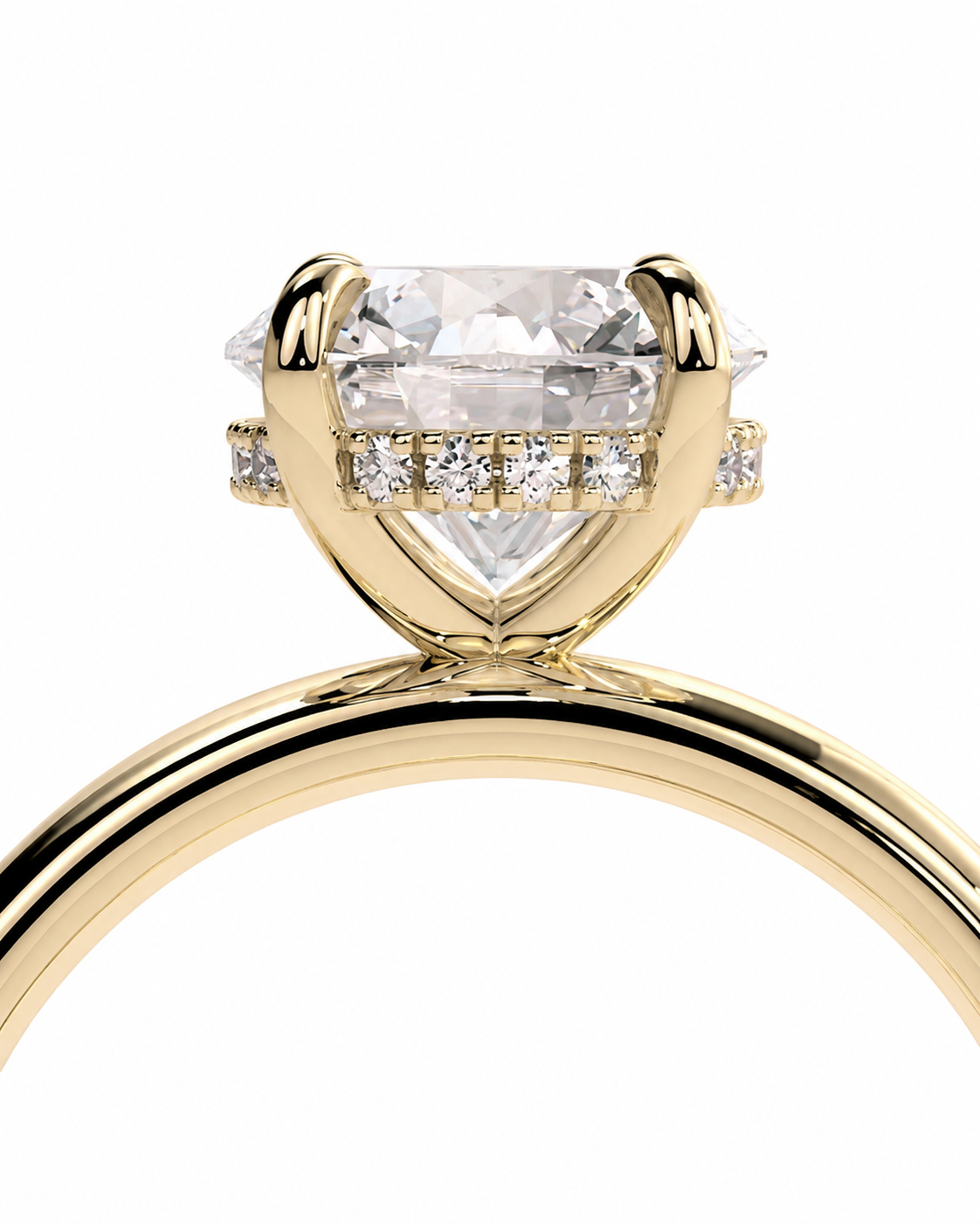 color_10K_YG, color_14K_YG &&A close-up of a yellow gold solitaire engagement ring featuring a large clear heart-shaped diamond center stone and smaller diamonds along the band, set against a plain white background.
