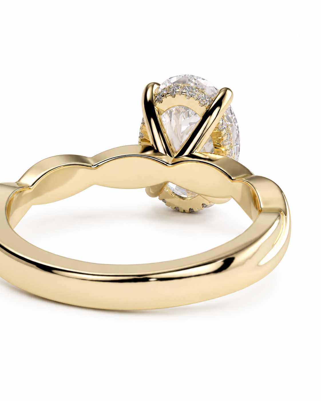 color_10K_YG, color_14K_YG &&
A gold ring with a wide, sculptural band and a large clear oval gemstone in a prong setting, shown on a white background.