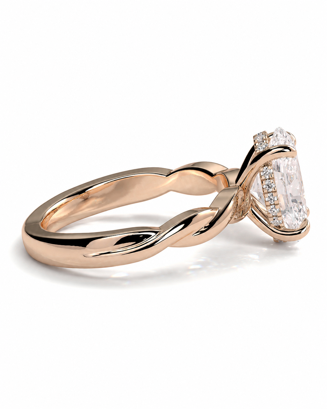 color_10K_RG, color_14K_RG &&
A rose gold ring with a twisted band and a large emerald-cut center stone, accented by small pave diamonds, shown on a white background.