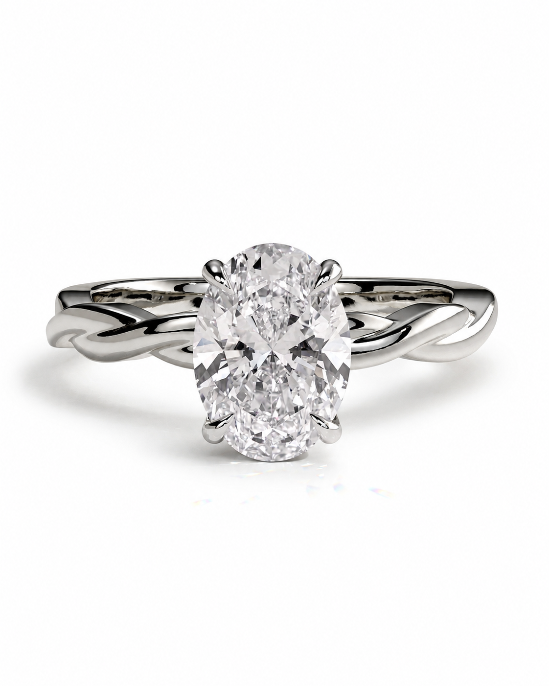 color_925_SIL,color_935_ARG,color_10K_WG, color_14K_WG &&
An oval-cut diamond engagement ring with a twisted band in a silver-colored metal, set against a plain white background.