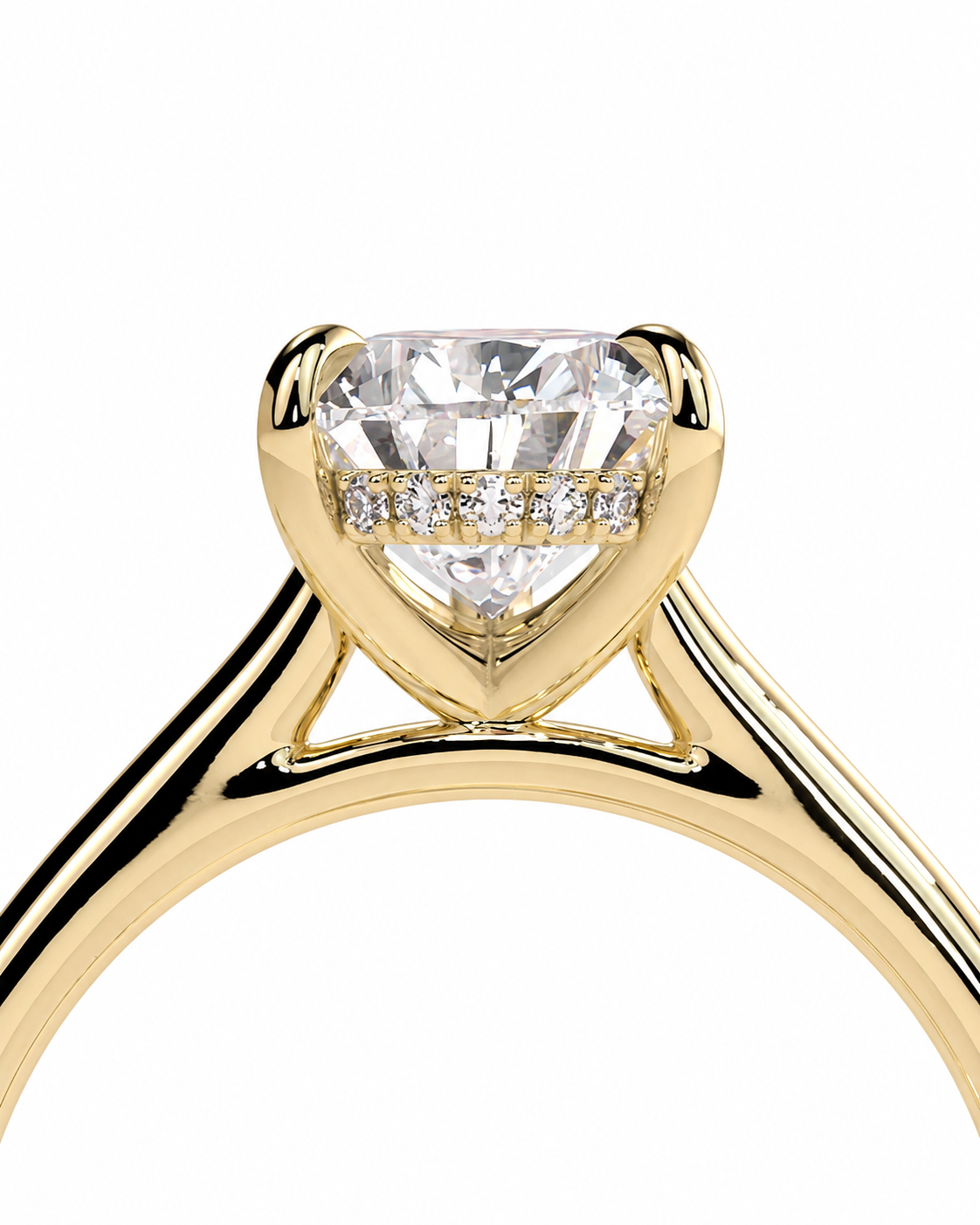 color_10K_YG, color_14K_YG &&A close-up of a yellow gold solitaire engagement ring featuring a heart-shaped clear gemstone in a prong setting, with a row of small accent diamonds along the band, set against a plain white background.
