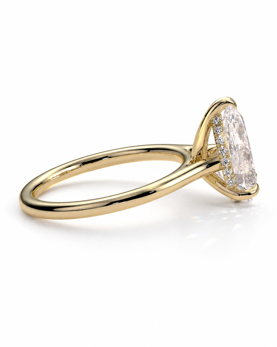 color_10K_YG, color_14K_YG &&A yellow gold engagement ring featuring a marquise-cut clear gemstone in a prong setting with a halo of small round stones, shown on a clean white background.