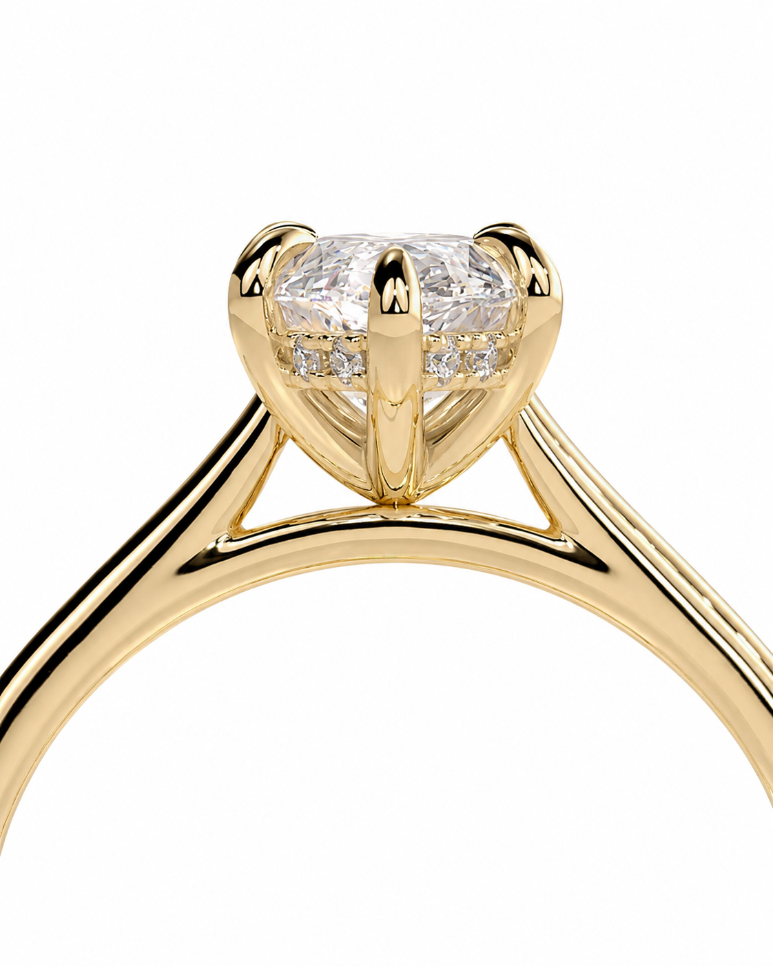 color_10K_YG, color_14K_YG &&A close-up of a yellow gold solitaire engagement ring with a round brilliant-cut diamond center stone and a halo of smaller diamonds, set against a plain white background.