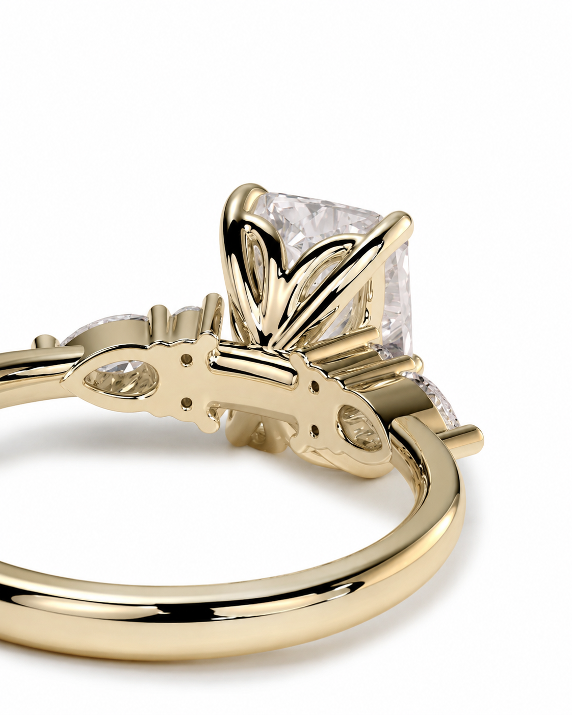 color_10K_YG, color_14K_YG &&A close-up shot of a yellow gold ring featuring a princess-cut clear center stone and smaller accent stones on a white background.