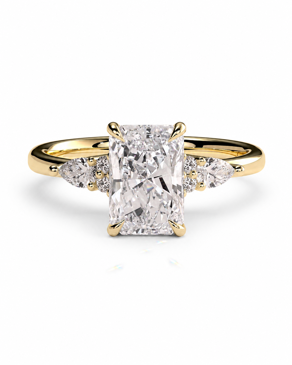 color_10K_YG, color_14K_YG &&A yellow gold engagement ring featuring a large rectangular emerald-cut diamond center stone with smaller round and marquise-cut diamonds on the shoulders, set against a clean white background.