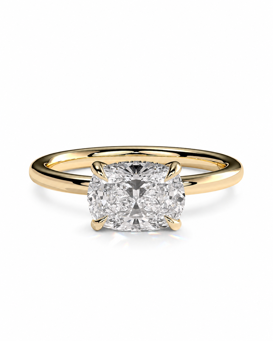 color_10K_YG, color_14K_YG &&A classic solitaire engagement ring featuring a cushion-cut diamond set in a yellow gold four-prong band, shown on a clean white background.