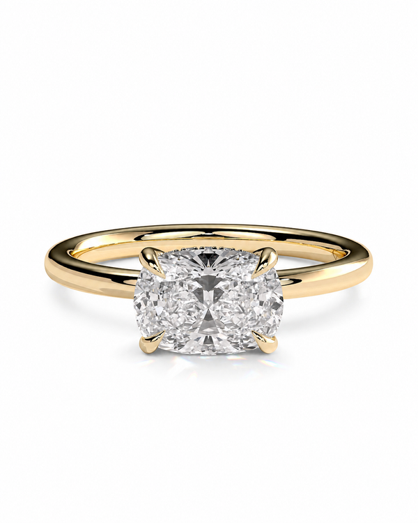 color_10K_YG, color_14K_YG &&A classic solitaire engagement ring featuring a cushion-cut diamond set in a yellow gold four-prong band, shown on a clean white background.