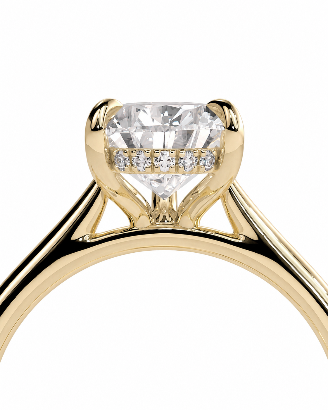 color_10K_YG, color_14K_YG &&A close-up of a yellow gold engagement ring featuring a large heart-shaped clear gemstone in a four-prong setting, with a row of smaller round diamonds along the band, set against a plain white background.