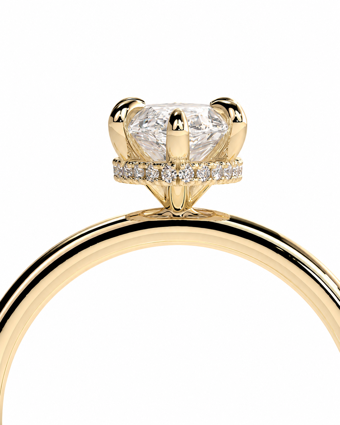 color_10K_YG, color_14K_YG &&A close-up of a yellow gold ring featuring a large round brilliant-cut diamond center stone in a prong setting, accented by a halo of small pavé diamonds on the band, set against a plain white background.