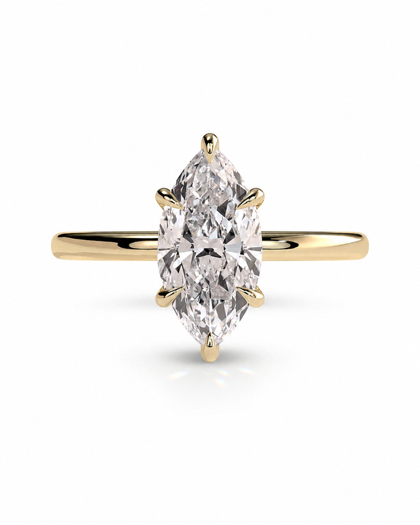 color_10K_YG, color_14K_YG &&A yellow gold ring featuring a marquise-cut diamond in a six-prong setting, shown against a clean white background.