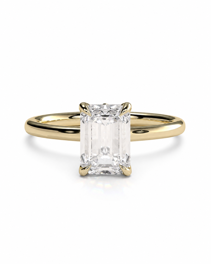 color_10K_YG, color_14K_YG &&An emerald-cut diamond engagement ring with a yellow gold band, shown on a clean white background.