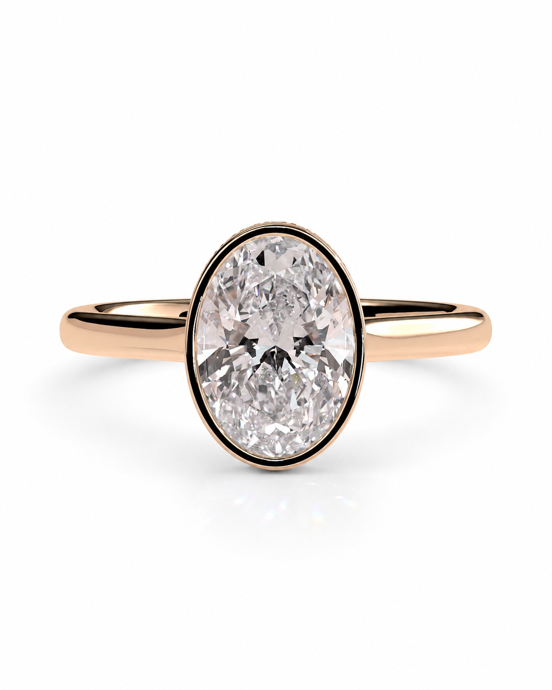color_10K_RG, color_14K_RG &&
An oval-cut diamond ring with a rose gold band, set against a clean white background.