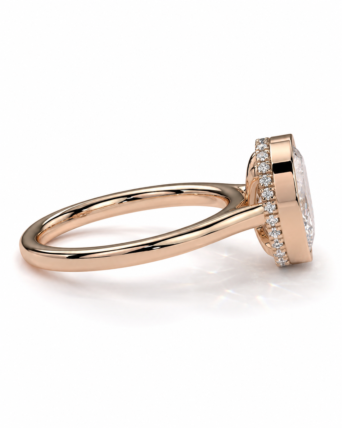 color_10K_RG, color_14K_RG &&
A rose gold engagement ring with a large oval center stone and a halo of small clear stones, shown in a three-quarter view on a white background.