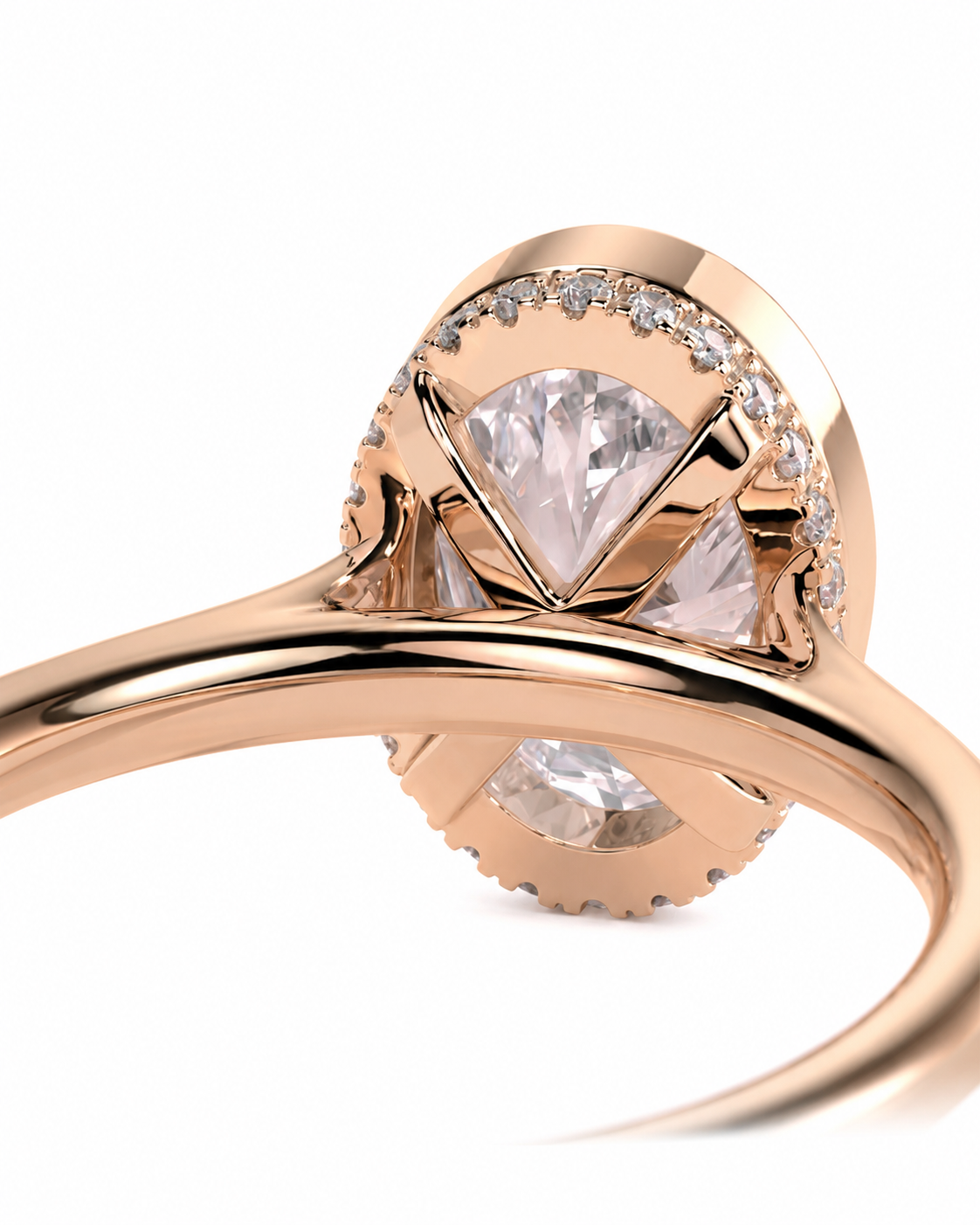 color_10K_RG, color_14K_RG &&
Rose gold ring with a marquise-cut center stone and small accent diamonds, shown in a close-up studio shot on a white background.