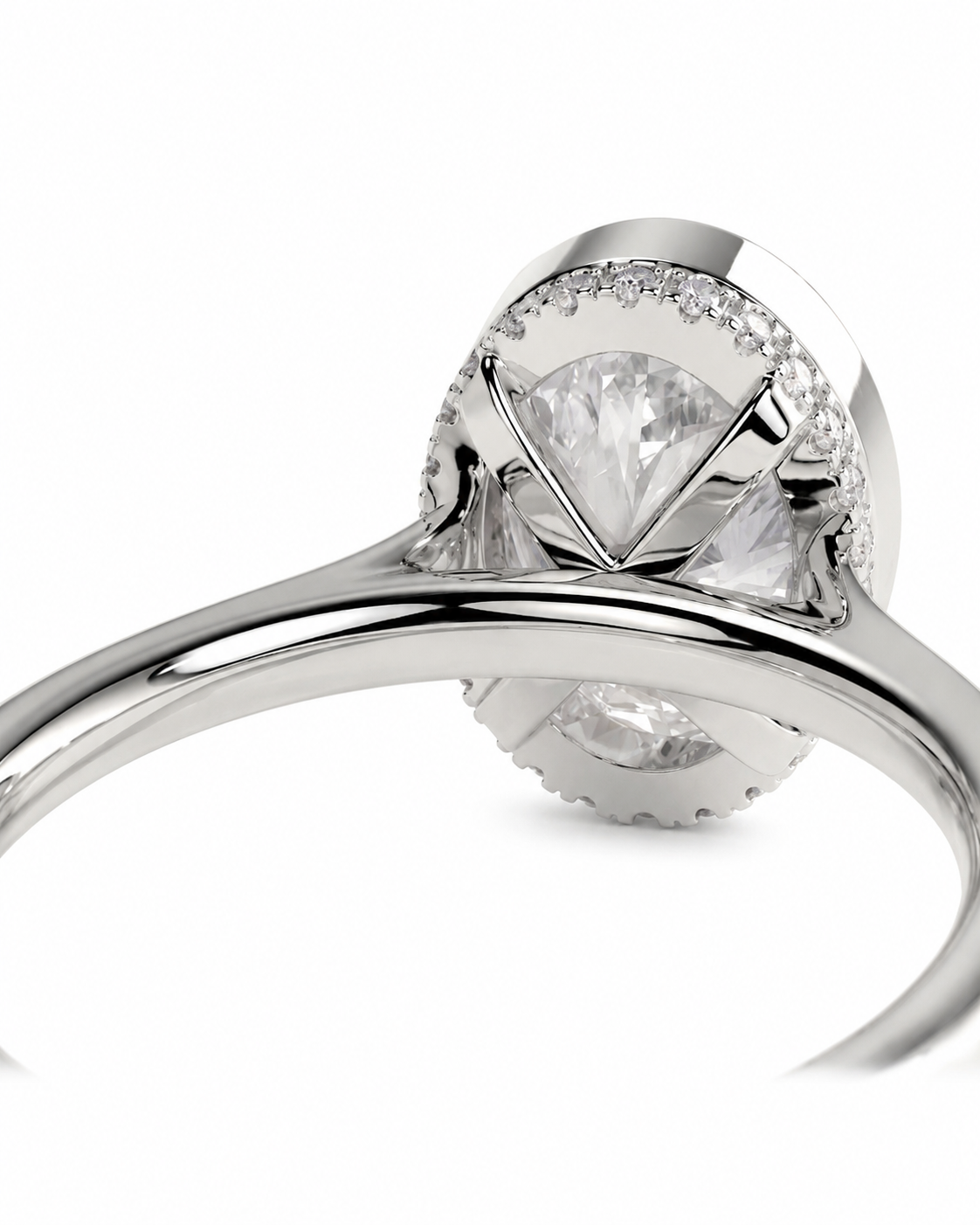 color_925_SIL,color_935_ARG,color_10K_WG, color_14K_WG &&
A close-up shot of a silver-toned ring featuring a large oval clear gemstone surrounded by a halo of small round stones, set on a polished band against a white background.
