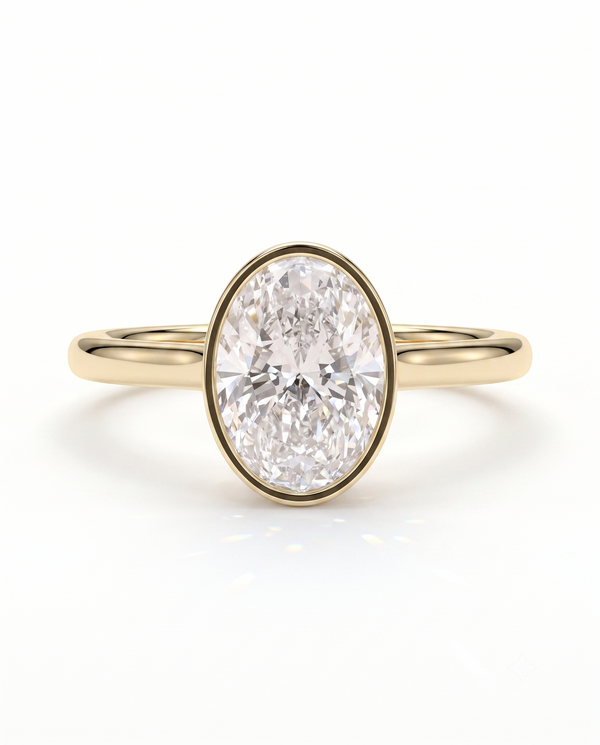 color_10K_YG, color_14K_YG &&
A yellow gold ring featuring a large oval-cut clear gemstone in a bezel setting, shown against a plain white background.