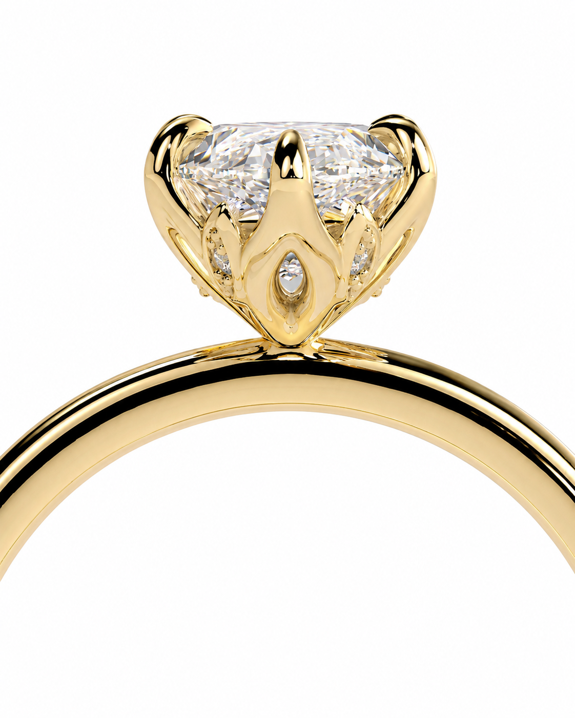 color_10K_YG, color_14K_YG &&A close-up shot of a yellow gold solitaire engagement ring with a brilliant round-cut diamond in a crown-like setting, featuring a small accent diamond on the band, set against a solid white background.