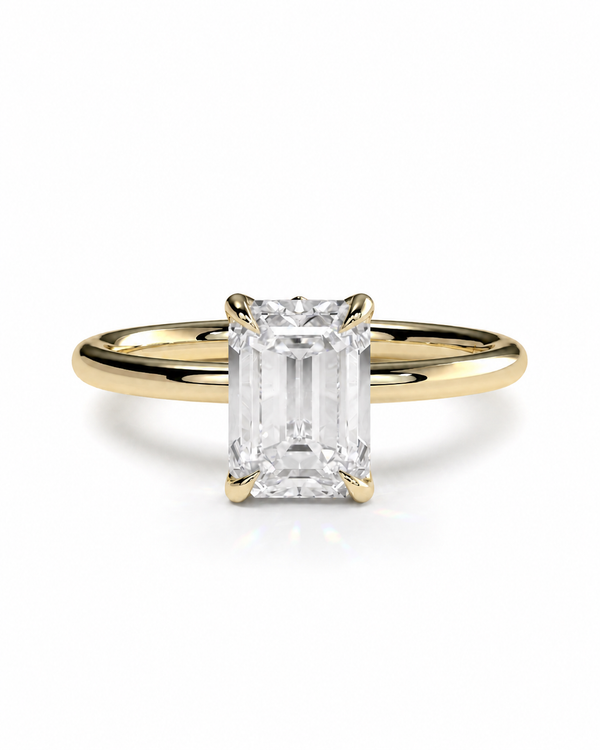 color_10K_YG, color_14K_YG &&An emerald-cut diamond engagement ring with a yellow gold band, shown on a clean white background.