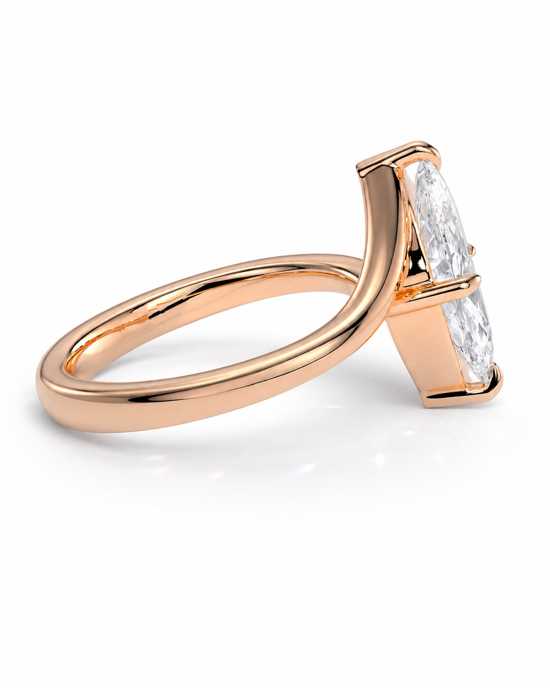 color_10K_RG, color_14K_RG &&
A rose gold ring featuring a marquise-cut clear gemstone in a prong setting, shown on a clean white background.