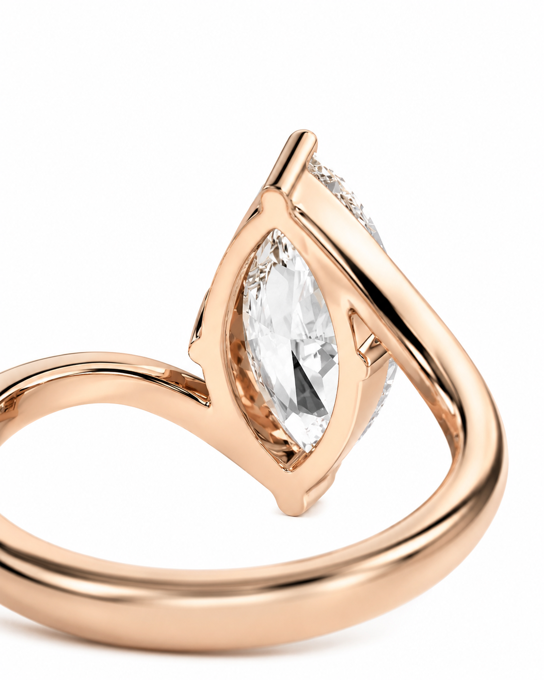 color_10K_RG, color_14K_RG &&
Rose gold ring with a marquise-cut clear gemstone in a split-prong setting, shown on a clean white background.