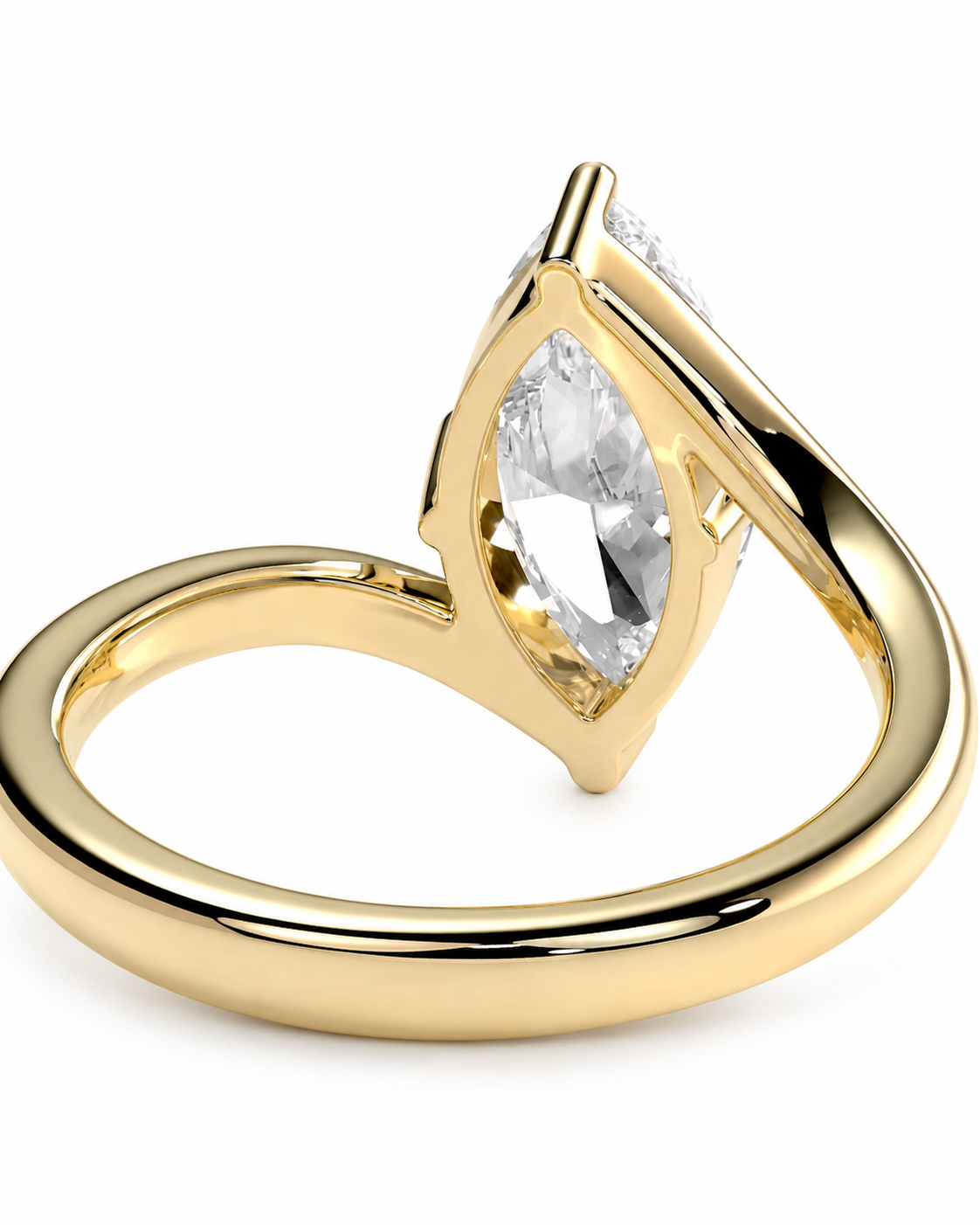 color_10K_YG, color_14K_YG &&
A yellow gold ring featuring a marquise-cut clear gemstone in a prong setting, with a smaller clear stone on the opposite side, shown on a plain white background.