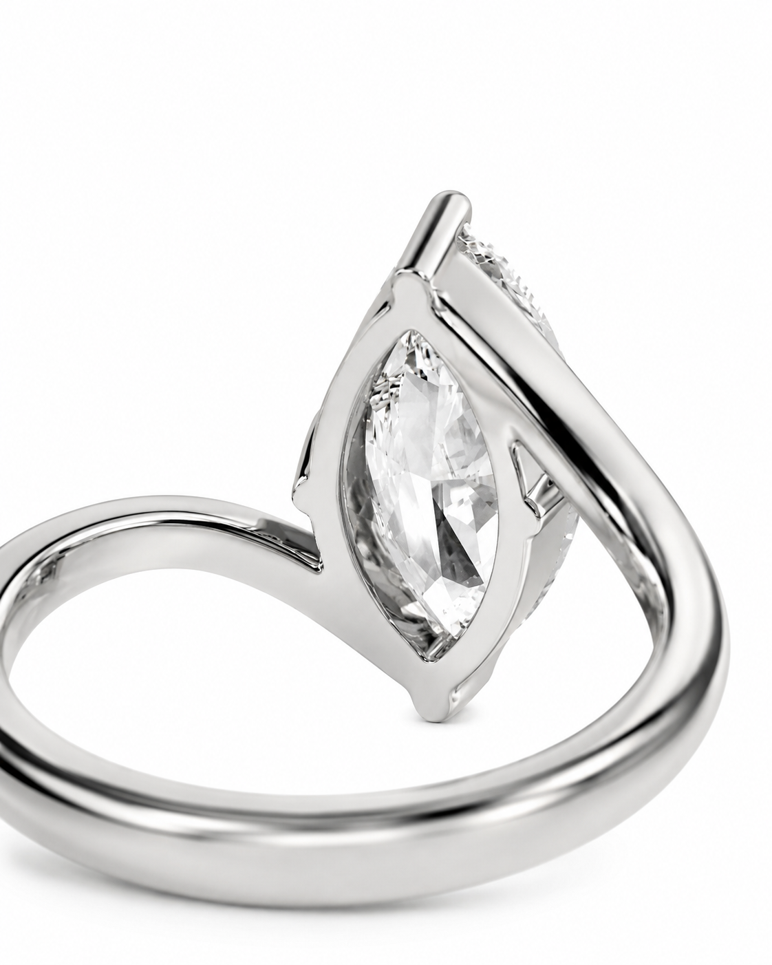 color_925_SIL,color_935_ARG,color_10K_WG, color_14K_WG &&
A silver-toned marquise-cut gemstone ring with a curved, intertwined band design, photographed on a clean white background.
