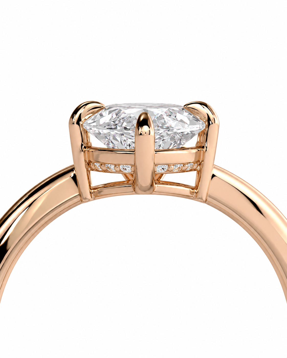 color_10K_RG, color_14K_RG &&
Close-up of a rose gold ring with a marquise-cut diamond center stone and small pave diamonds on the band, shown on a white background.