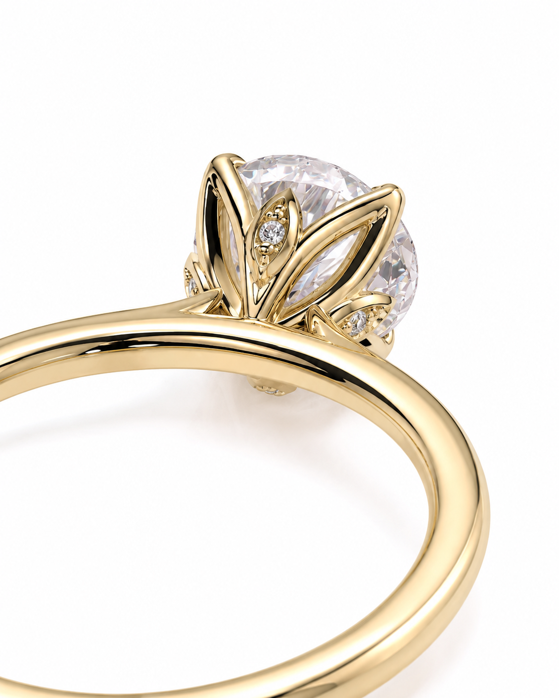 color_10K_YG, color_14K_YG &&A close-up of a yellow gold ring featuring a large round clear gemstone in a leaf-like floral setting with small accent diamonds, shown on a white background.