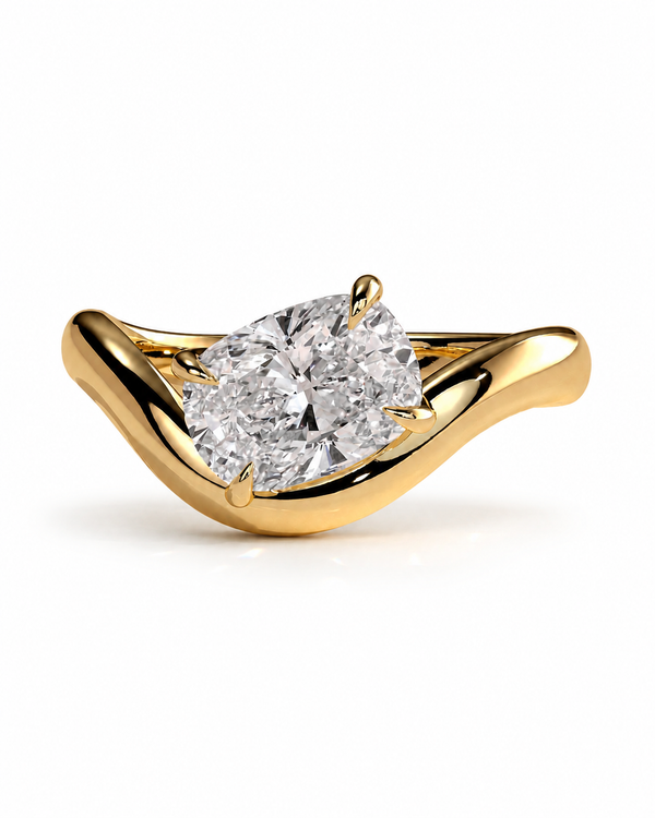 color_10K_YG, color_14K_YG &&A yellow gold ring featuring a large, round brilliant-cut diamond center stone in a prong setting, set against a clean white background.