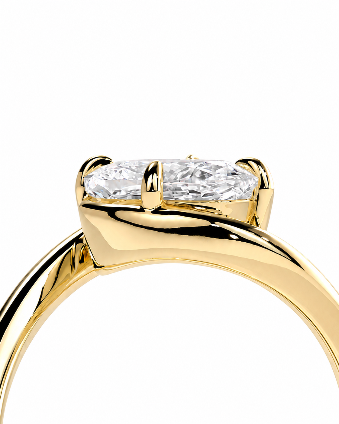 color_10K_YG, color_14K_YG &&A close-up of a yellow gold ring setting with two clear rectangular baguette-cut gemstones in a four-prong setting, shown against a plain white background.