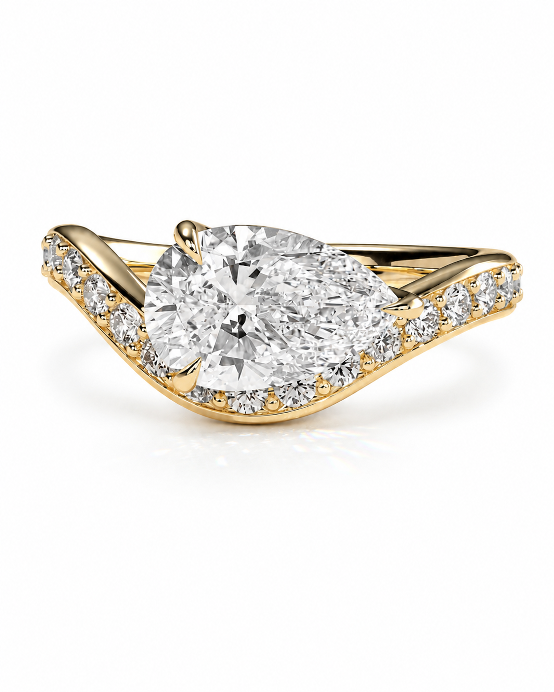 color_10K_YG, color_14K_YG &&A yellow gold diamond ring with a large pear-cut center stone and smaller diamonds along the curved band, shown on a clean white background.