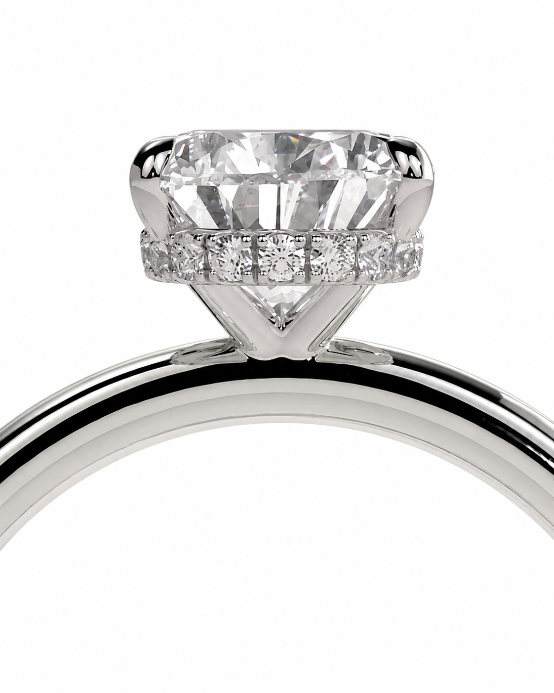 color_925_SIL,color_935_ARG,color_10K_WG, color_14K_WG &&
A close-up studio shot of a diamond ring featuring a large round-cut center stone in a prong setting, with a halo of smaller diamonds along the band, shown against a plain white background.