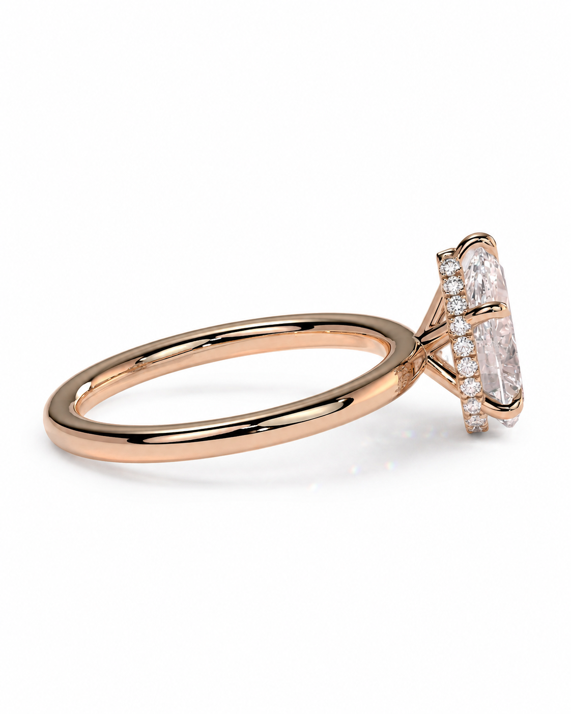 color_10K_RG, color_14K_RG &&
A rose gold ring with a large marquise-cut center stone and smaller accent stones, shown in a three-quarter view on a clean white background.