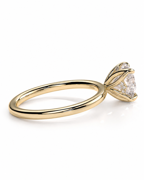 color_10K_YG, color_14K_YG &&A yellow gold solitaire engagement ring with a clear round-cut diamond, shown on a clean white background.