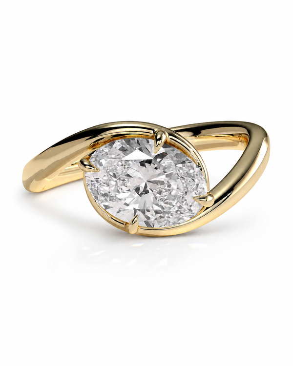 color_10K_YG, color_14K_YG &&A yellow gold ring featuring a large, round brilliant-cut diamond in a prong setting, with a split-band design that curves around the center. The ring is photographed on a clean, solid white background.