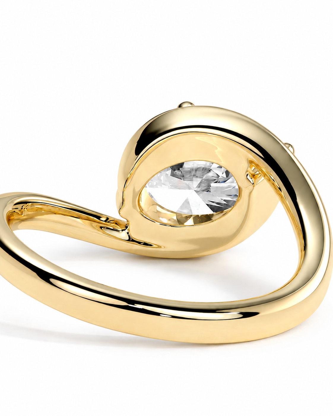 color_10K_YG, color_14K_YG &&A close-up of a polished gold ring featuring a large, oval-cut clear gemstone in a bezel setting, shown against a plain white background.