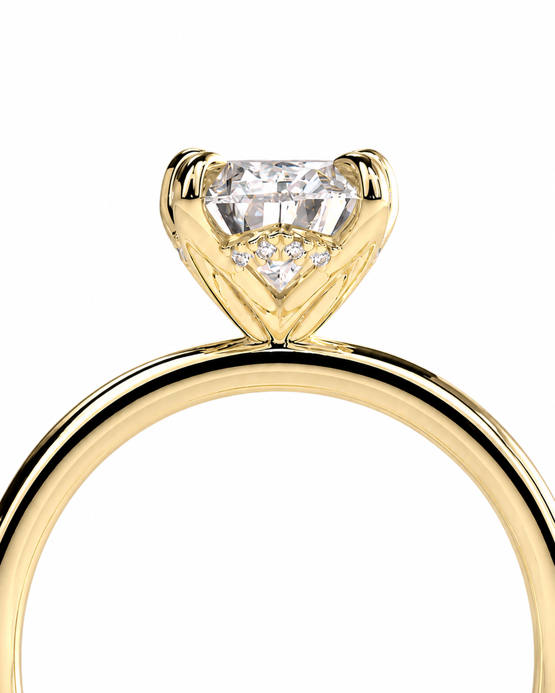 color_10K_YG, color_14K_YG &&A close-up of a yellow gold solitaire engagement ring featuring a heart-shaped clear gemstone in a prong setting with a small diamond accent below it, shown on a plain white background.