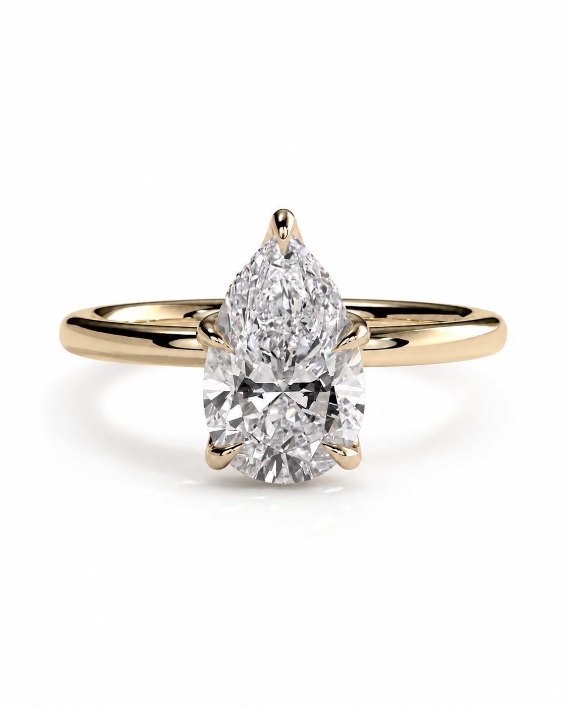 color_10K_YG, color_14K_YG &&A pear-cut diamond engagement ring with a yellow gold band, shown on a clean white background.