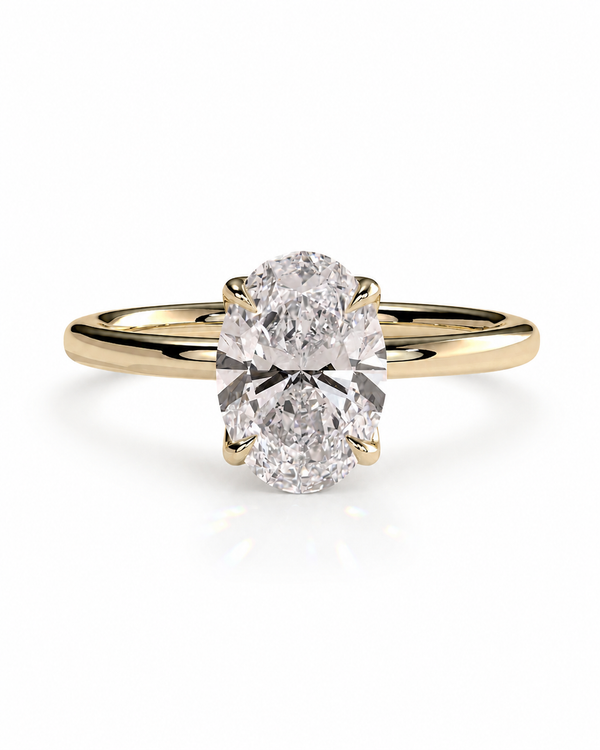 color_10K_YG, color_14K_YG &&A yellow gold solitaire engagement ring featuring a large oval-cut diamond set in a four-prong setting, shown on a clean white background.