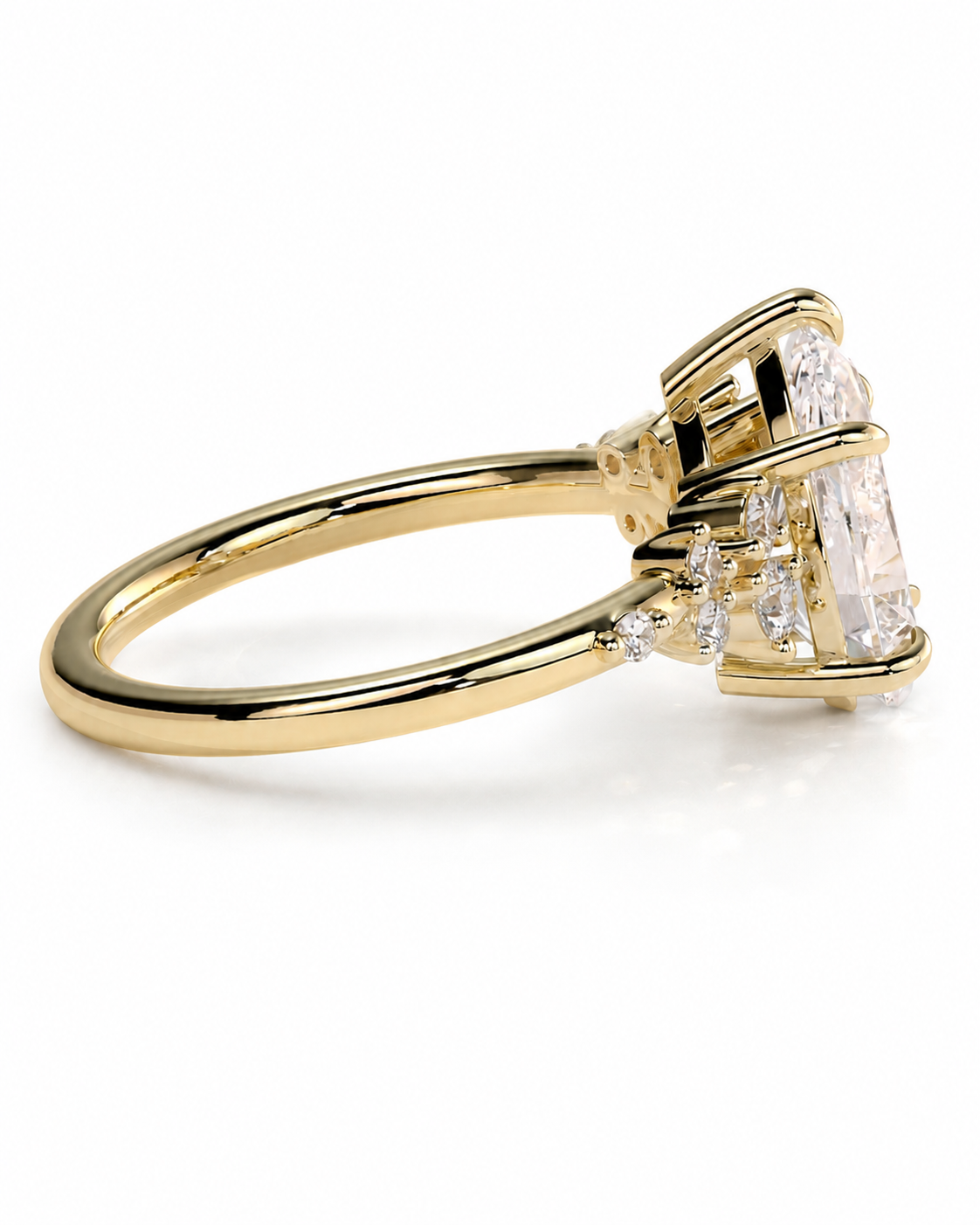 color_10K_YG, color_14K_YG &&A yellow gold ring with a large rectangular clear gemstone and smaller accent stones, shown on a clean white background.
