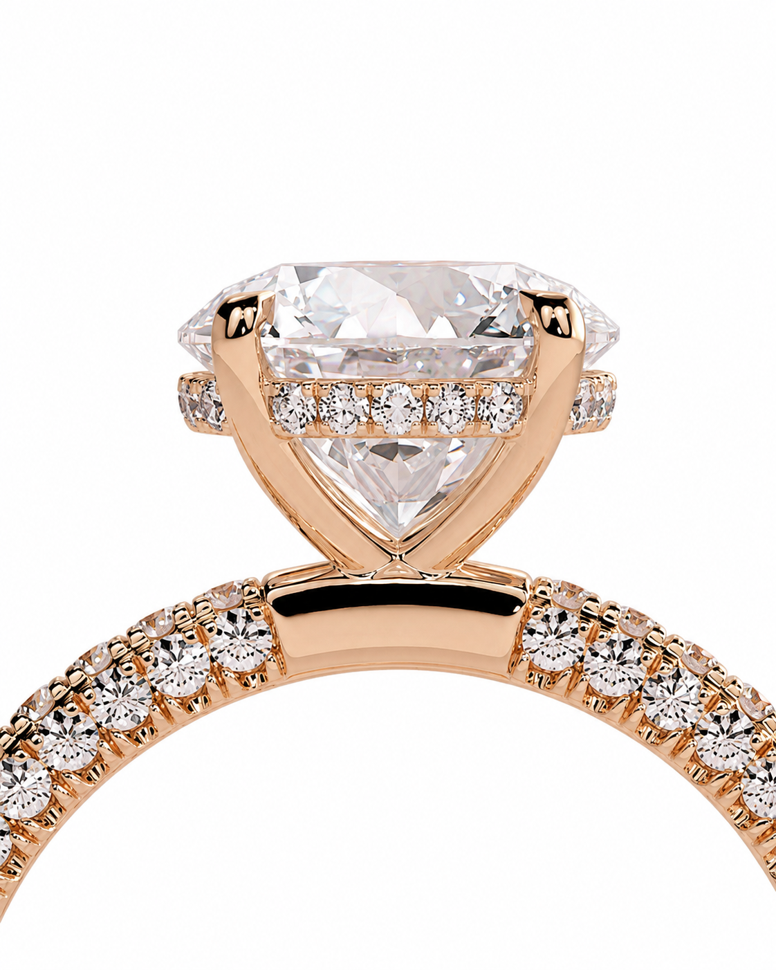 color_10K_RG, color_14K_RG &&
Rose gold engagement ring featuring a large marquise-cut clear center stone and a halo of small diamonds, with a diamond-paved shank, shown on a white background.