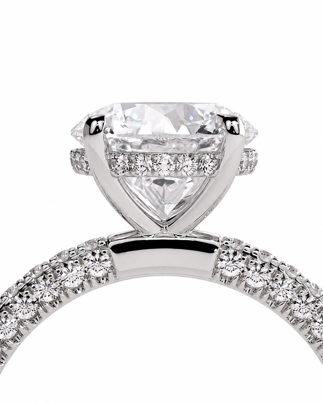 color_925_SIL,color_935_ARG,color_10K_WG, color_14K_WG &&
A close-up studio shot of a silver-toned diamond ring featuring a large pear-cut center stone and pave-set diamonds along the band and shoulders, set against a plain white background.