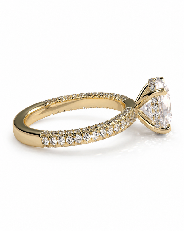 color_10K_YG, color_14K_YG &&
A yellow gold engagement ring featuring a large triangular-cut center stone and a pave-set band with small round diamonds, shown on a clean white background.